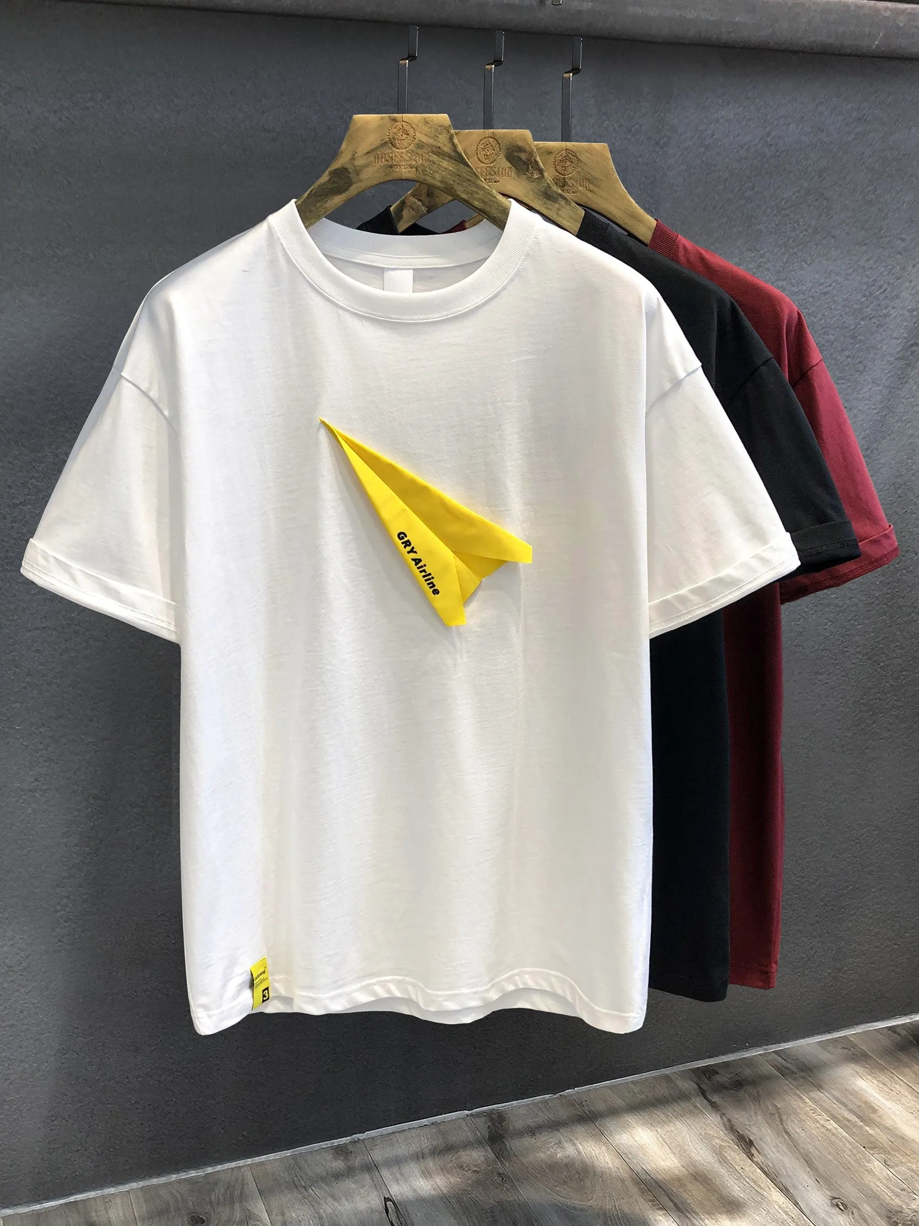 Men's T-shirts creative paper airplane sticker embroidered short sleeved T-shirt